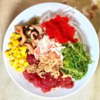 Kahuna Bowl · Spicy. Tuna in Hawaiian sauce, ika sansai, crab salad, sweet onions, corn, tobiko, seaweed s...