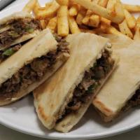 Phily Steak · grilled with onion, bell peppers. served  on pita bread