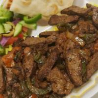 Kbeda Plate (Liver) · half  pound of Liver grilled with onions, bell peppers, and tomatoes served with rice, salad...
