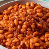 Fasulye (Bean) · white beans mixed with tomatoes sauce onions and spices. served with Pita.
