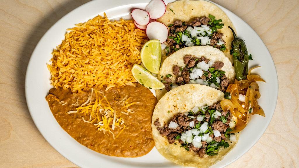 Taco Special · 3 tacos with rice and beans.