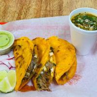 Birria Quesatacos · Three crispy and cheesy beef birria quesatacos with consomé soup on the side. Topped with ci...