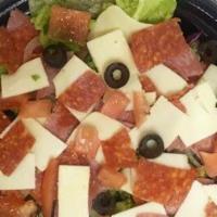 Small Chef Salad · Freshly made with lettuce diced tomatoes onions green peppers black olives shredded carrots ...