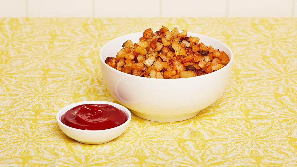 Home Fries · Soft cooked diced potatoes.