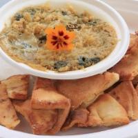 Spinach Artichoke Dip · Warmed until bubbling, served with pita or socca (+2)