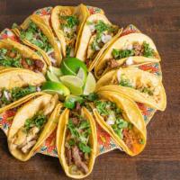 Street Taco · Meat, onion, cilantro on a soft corn tortilla