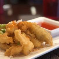 Fried Calamari · Deep-fried crispy calamari on topped with cilantro, seasoning salt, green onion served with ...