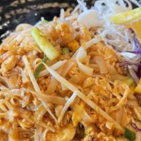 Pad Thai · Stir-fried rice noodle with homemade pad Thai sauce, egg, bean sprout, and green onion, crus...