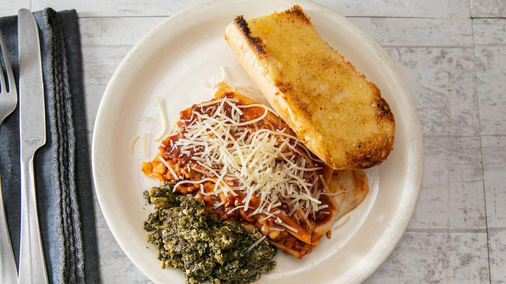 Lasagna · Pasta noodles layered with Mozzarella, Romano cheese, Italian sausage, and our homemade meat sauce.