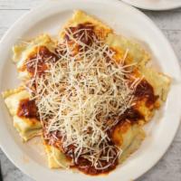 Ravioli · Filled with our own spicy blend of beef, pork, and spinach, and topped with our homemade mea...
