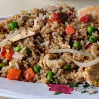 Wang'S Fried Rice · Combination fried rice with shrimp, chicken, pork and vegetables