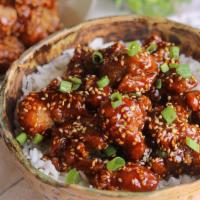 Golden Sesame Chicken · Chicken chunks, deep fried with sophisticated brown sauce and sprinkled with sesame seeds.