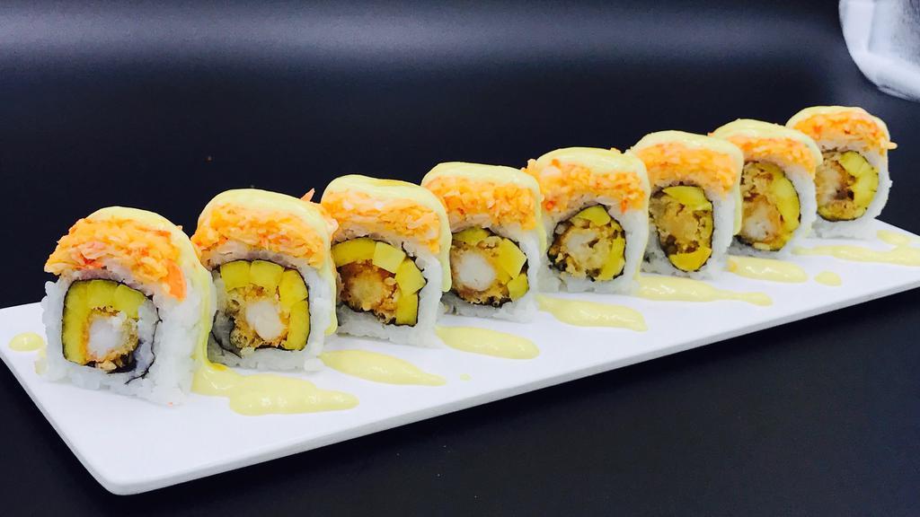 Hawaii Roll · Spicy. Cooked. Tempura shrimp and mango with spicy crab meat on top. Spicy. Sauce: honey and citrus sauce.