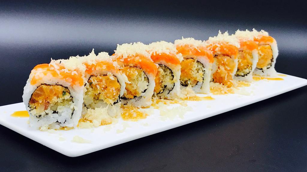 Dynamite Roll · Hot. Spicy yellowtail & crunch with spicy tuna and crunch on top. Sauce: chef's special sauce.