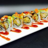 King Roll · Shrimp tempura with eel and avocado on top. Sauce: eel sauce & masago.
