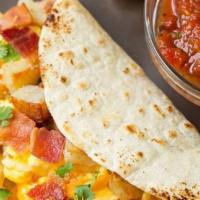 Breakfast Tacos · Eggs, hash browns, cheese and your choice of meat served on either flour or corn tortillas w...
