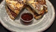 Classic French Toast · Topped with powdered sugar and served with side of syrup.