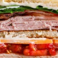 Rb Club · Ham, turkey, bacon, tomato, spinach, mozzarella and mayo served on sourdough with a side of ...
