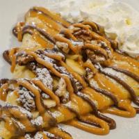 Funky Monkey Crepe · Our best-selling Funky Monkey features a layer of Nutella and peanut butter inside and out. ...