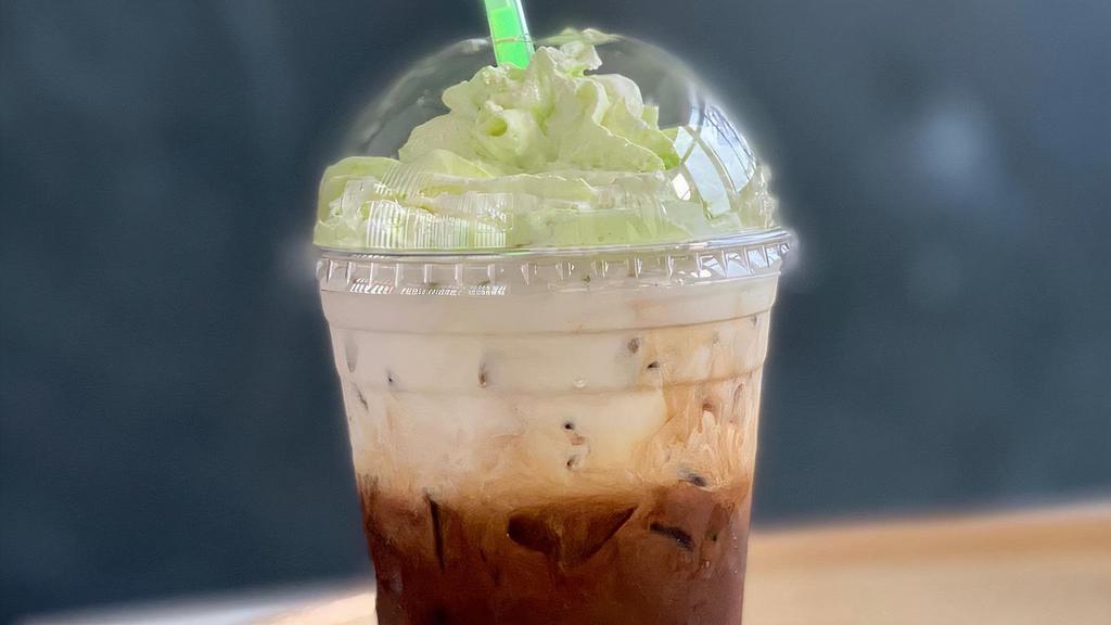 The Force (16Oz Iced Only) · 4 shots of espresso mixed with dark chocolate, milk chocolate, and toffee nut poured over ice. Topped off with heavy cream