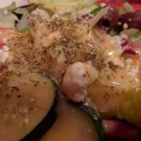 Greek Salad Bowl · Feta cheese, ripe olives, salonika peppers with Italian dressing.