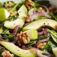 California Salad · Slices of fresh oranges, avocado slices, red onions, black olives. Almonds and mixed greens ...