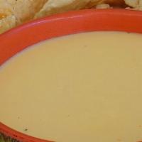Cheese Dip · A melted mixture of Mexican cheeses with jalapeños for a little spice.
