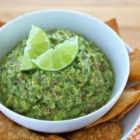 Fresh Guacamole Dip · Our handmade guacamole is made of fresh avocados, onions. Tomatoes, fresh lime juice and cil...