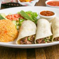 Tacos Mexicanos · Three tacos with your choice of grilled chicken or steak with chopped onion and cilantro ser...