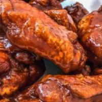Chicken Wings (6) · Enjoy a platter of the supremely tasty wings that started brother z's wang's tossed in any o...