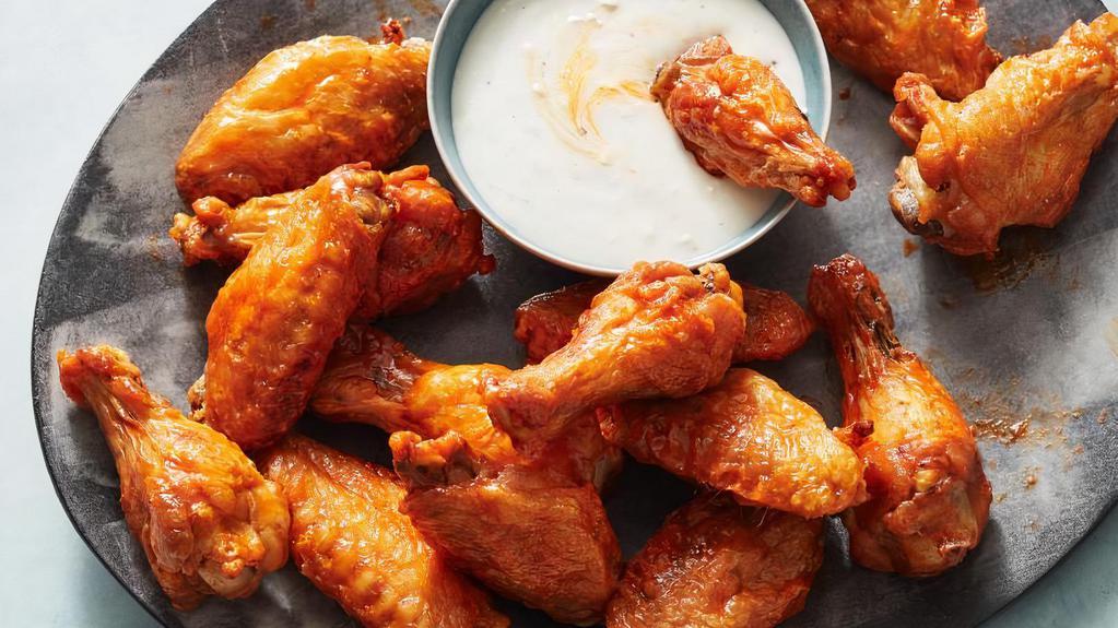 Hot Wings (6) · Six fried spicy seasoned chicken wings, served with ranch sauce.