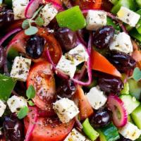 Greek Salad · Fresh lettuce, bell pepper, tomato, onion, cucumber, feta, Kalamata, olives & vinegar dressi...