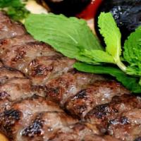 Kofta Kebab Platter · Grilled traditional Mediterranean seasoned ground beef.