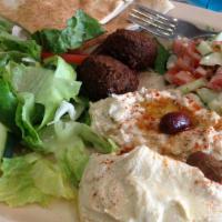 Vegetarian Plate · Hummus, falafel, baba ghannouj, spicy potatoes, and a salad.