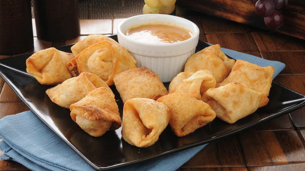 Crab Rangoon · 8 fried wontons filled with crab and cream cheese.