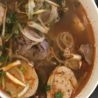 Bun Bo Hue · Spicy beef-based broth soup with thick vermicelli noodles beef shank vietnamese pork bologna...