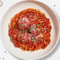 Spaghetti & Meatballs · Al dente spaghetti in our house made garlic marinara sauce paired with meatballs and topped ...