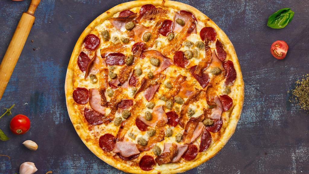 Meat Lovers Pizza · Take your pick of our famous house made or gluten-free dough topped with red sauce, pepperoni, salami, canadian bacon, and our house cheese blend