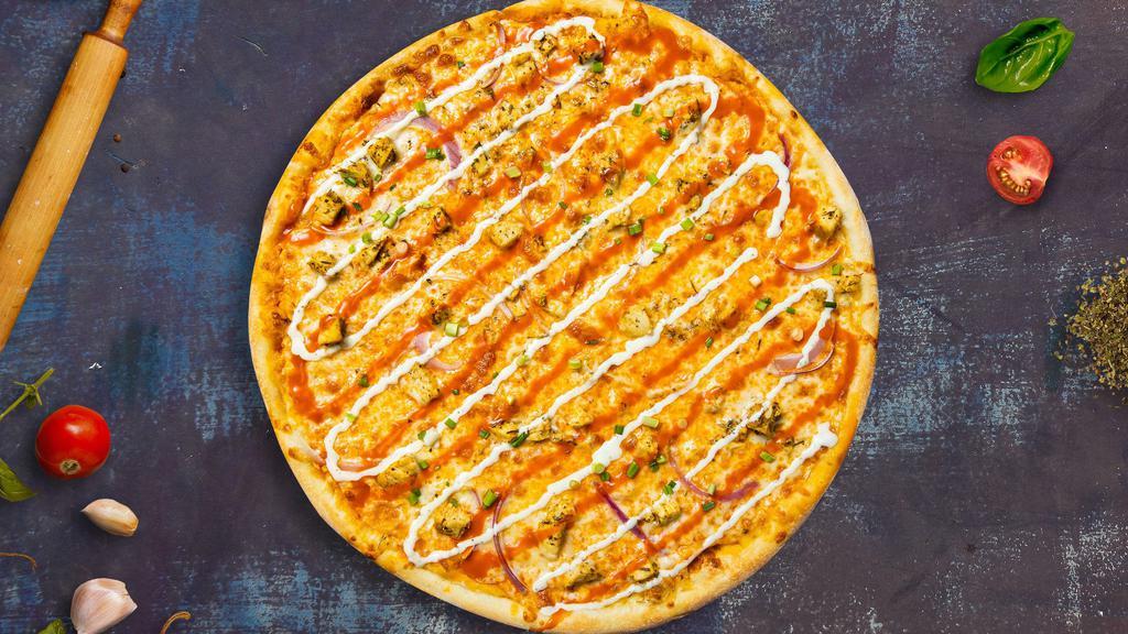 Buffalo Chicken Pizza · Take your pick of our famous house made or gluten-free doughtopped with buffalo chicken and mozzarella cheese.