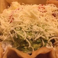 Taco Salads · All taco salad comes with beans, lettuce, sour cream, guacamole, tomatoes, and cheese.