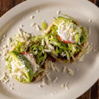 Sopes · 3 small thick tortilla with meat, lettuce, sour cream, avocado and beans. Choice of any of o...