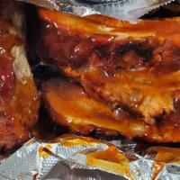 Baby Back Ribs (No Sides) · Meaty grilled baby back ribs with our famous spicy or original sauce.
