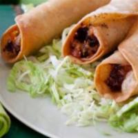 Flautas · Fried tortilla's filled with Steak or Chicken and cheese. Choice of salad or rice & beans.