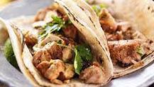 Tacos (2) · Grilled Chicken, beef, pork - topped with pico, cheese, lettuce, cilantro, and sliced avocado.