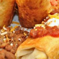 Chimichangas · Grilled chicken, beef, pork - sour cream, pico, topped with white queso. Choice of salad or ...
