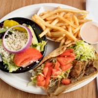 Gyro Plate · Greek salad and fries.