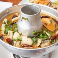 Seafood Soup (Po Taek) · Traditional medley of shrimp, scallops, squid, mussel & mushroom cooked in a hot and sour to...