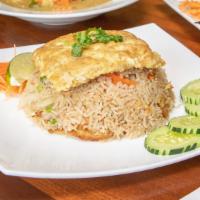 Combination Of Fried Rice · Combination of shrimp, chicken, beef & pork cooked with rice, onion 6 eggs