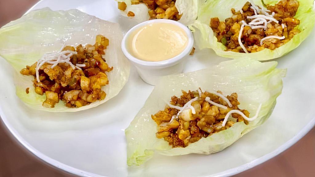 Lettuce Wrap · Caramelized water chestnuts, shiitake mushroom and celery in crisp lettuce cups. Gluten-free version available.