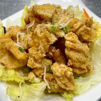 Thai Herbal Calamari · Lightly fried thai herb tender calamari, served with thai spicy sauce.